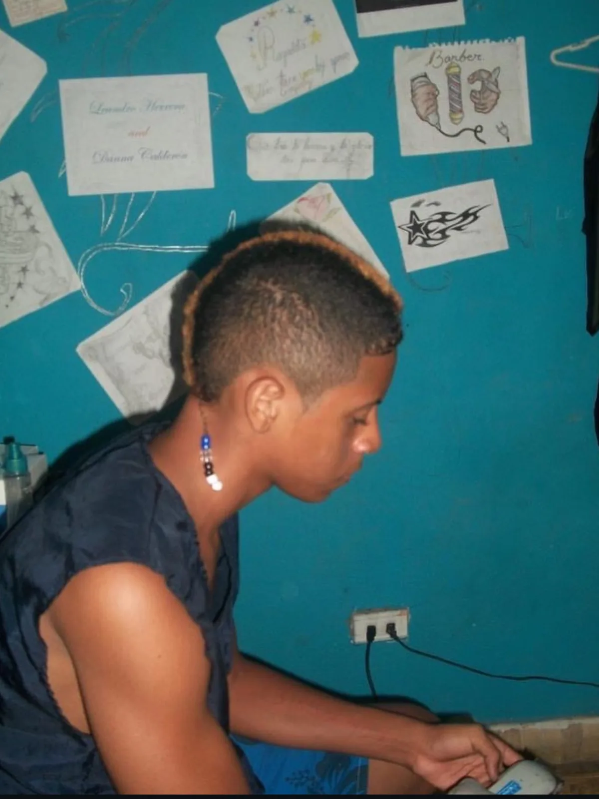 A high top with shaved sides, cut by Leandro Herrera