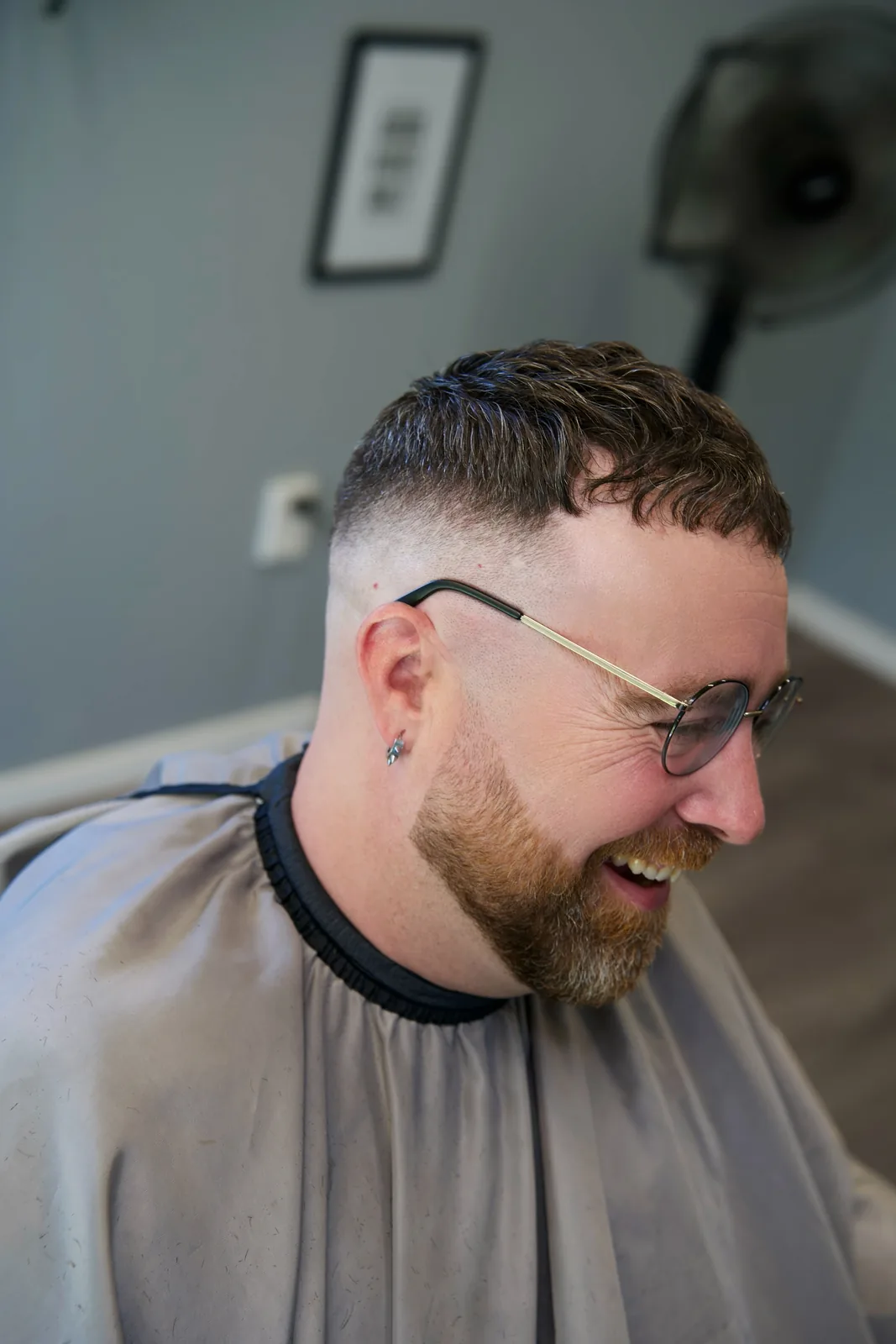 A mid fade with a beard trim, cut by Leandro Herrera