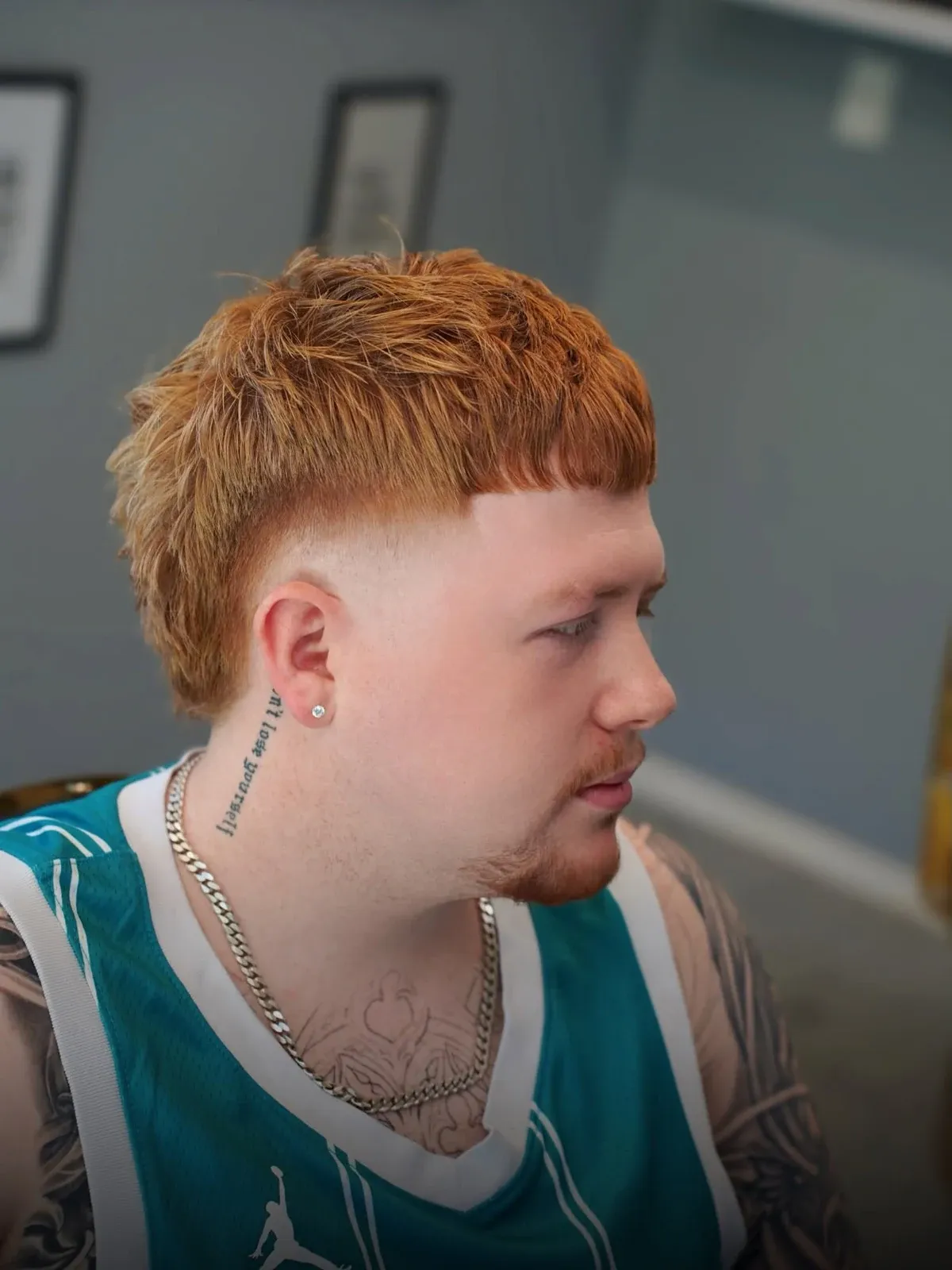 A ginger mullet with faded sides, cut by Leandro Herrera