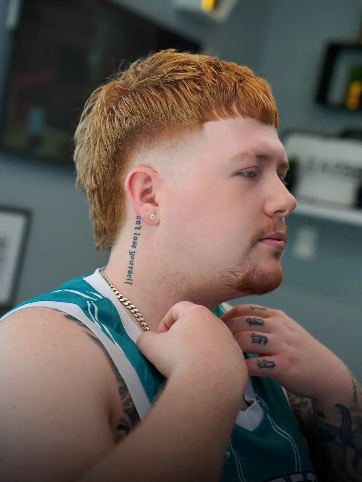 A ginger mullet, in profile, cut by Leandro Herrera