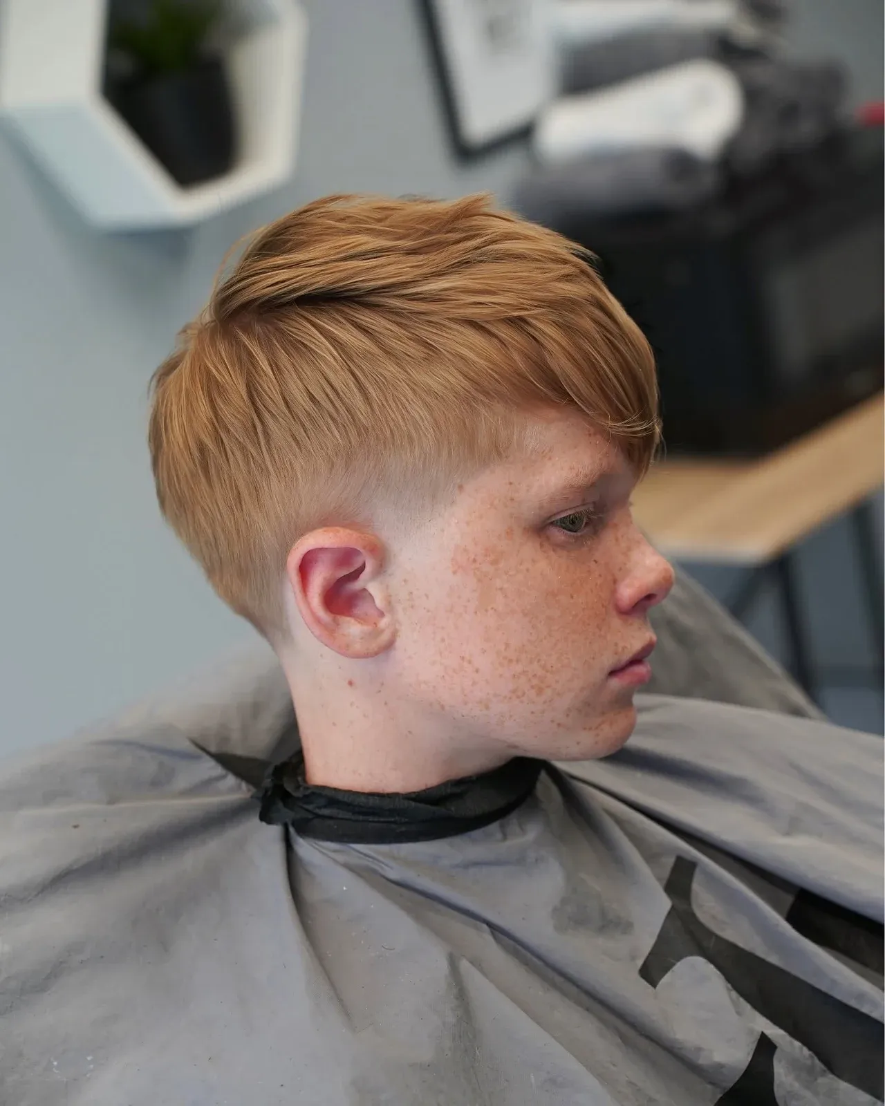 A blond crop with faded sides, cut by Leandro Herrera